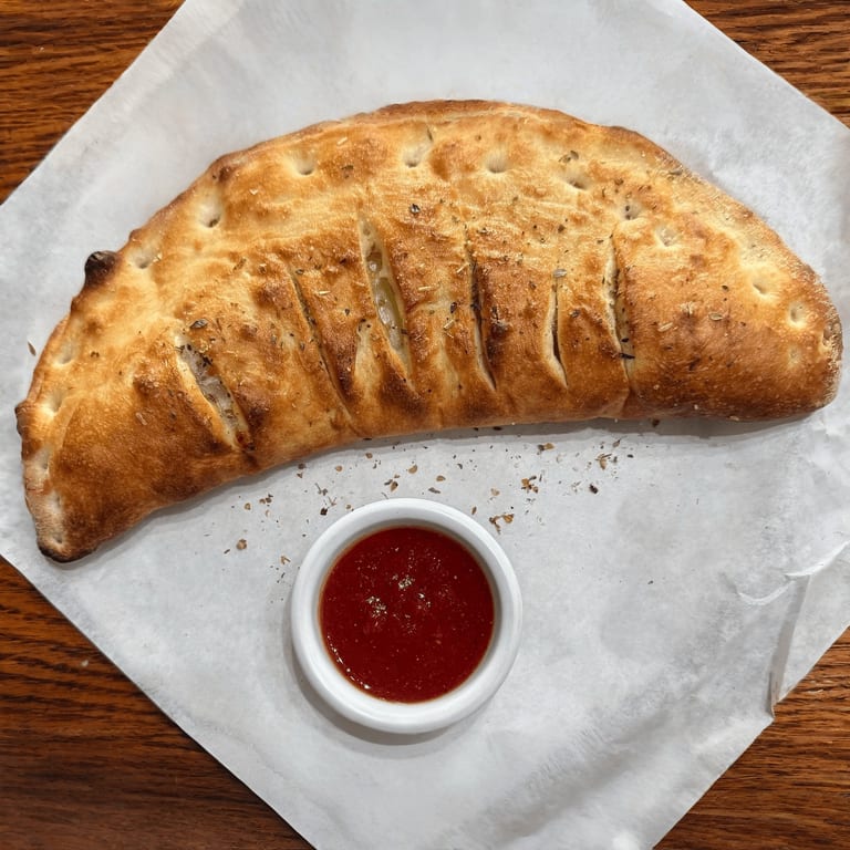 Savor Our Calzone
